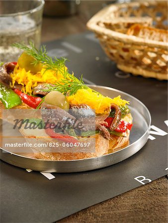 Anchovy and pepper open sandwich