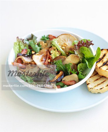 Pleurotus mushroom,diced bacon and pine nut salad