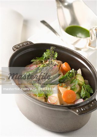 Casserole dish of vegetables with herbs