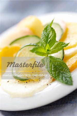 Yellow and white peach salad with mint