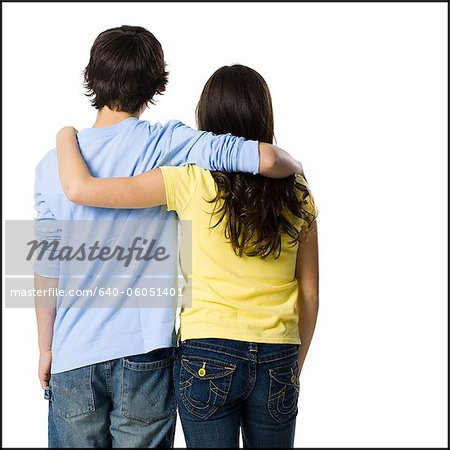 young couple with their arms around one another