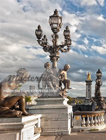 Detail of an sculpture in the Alexandre III bridge in Paris, France