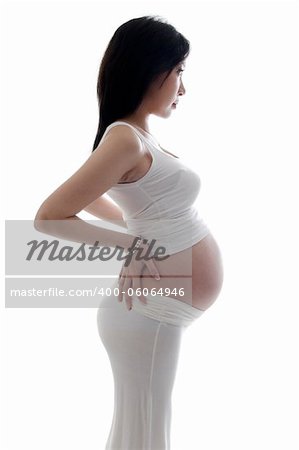 Side view of pregnant lady on white background