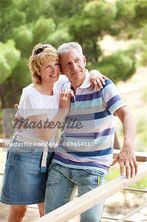 Portrait of a happy mature couple outdoors.