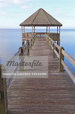 Public gazebo and dock over Whale Head Bay off of Currituck Sound on the Outer Banks near Corolla, North Carolina vertical