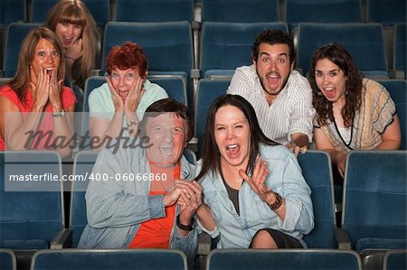 Group of frightened people screaming out in fear