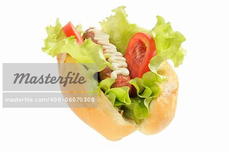 Tasty and delicious hotdog. Isolated on white.