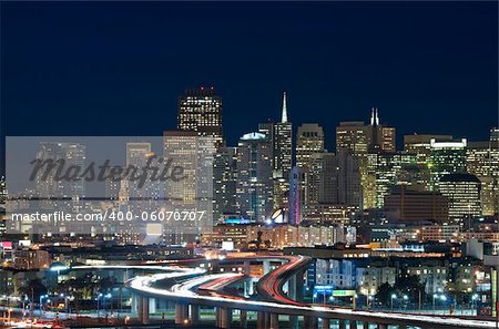 Image of San Francisco skyline and busy highway leading to the city.