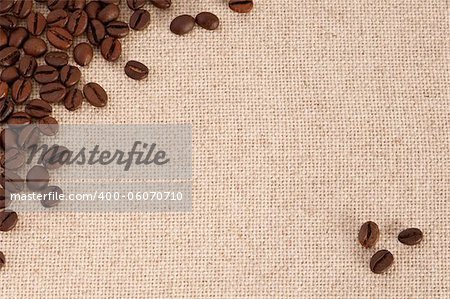 A background with coffee beans on canvas