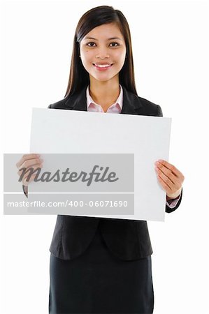 Mixed race Asian businesswoman holding a white board