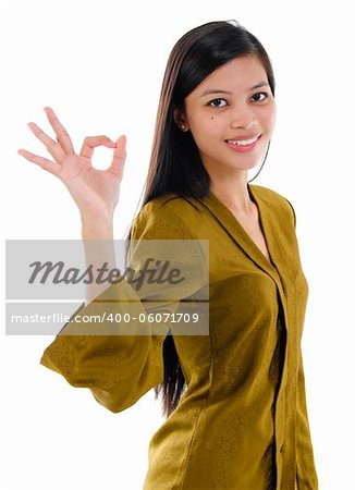 Asian female okay hand sign with great smile.
