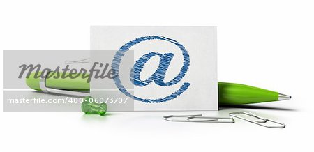 at symbol sketched onto a white business card with ballpoint pen thumbtack and paperclips over a white background with reflection