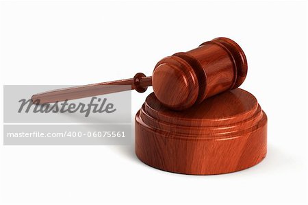 Wooden gavel with sound block over white background
