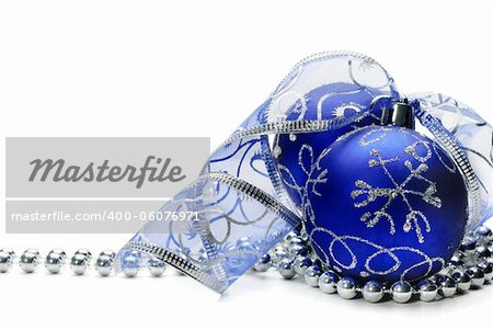 Blue christmas ornament on white background