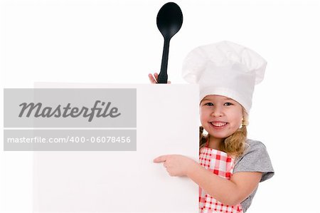 girl in chef's hat indicates on blank sheet isolated on white background