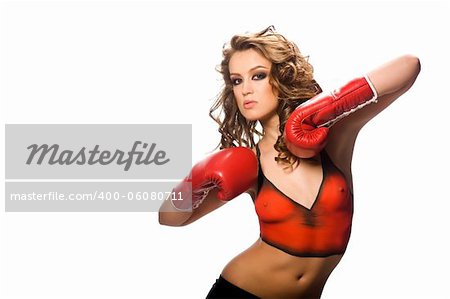 beautiful brunette with a body painting with boxing gloves on an isolated background