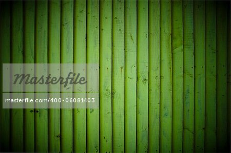 Green wood wall background with vignette