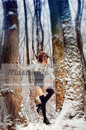 fashion girl in winter forest