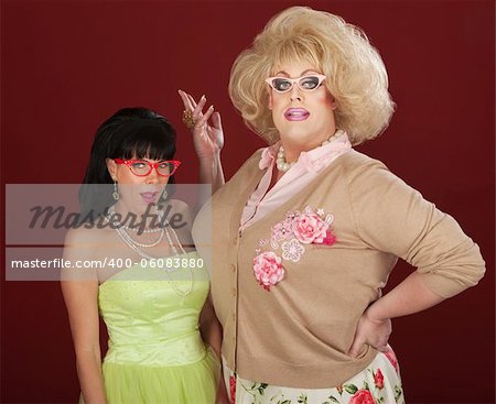 Exceited woman with drag queen wearing thick eyeglasses