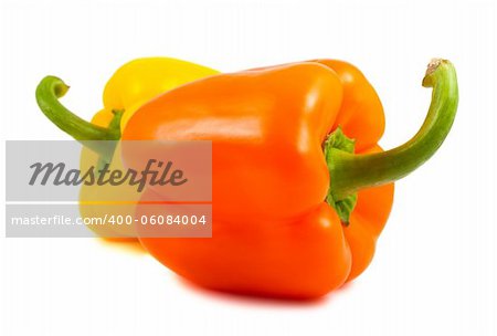 Yellow and orange peppers isolated on white background