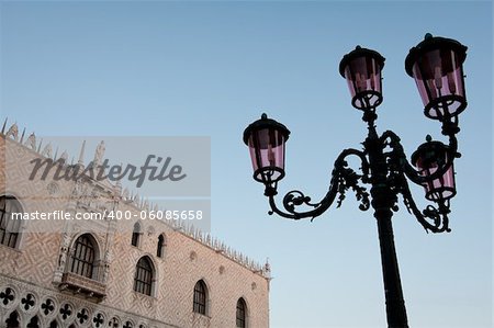 Lamp against the basilica church in San Marco square in Venice, Italy
