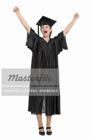 Happy female student celebrating graduation. HQ photo. Not oversharpened. Not oversaturated