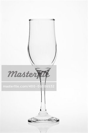 Empty transparent wine glass on white