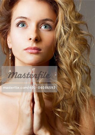 Beautiful Young Woman Face. Close-up studio portrait.