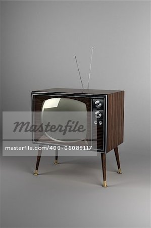 Classic vintage TV with wood veneer design in studio