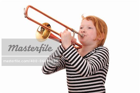 Young girl playing a trombone on white background