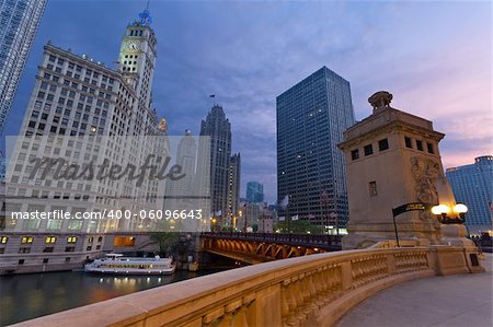 Image of the Chicago riverside downtown district during sunrise.