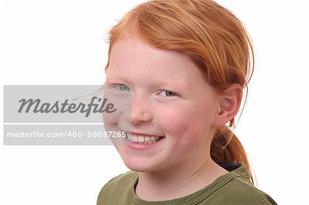 Portrait of a young redhaired girl on white background