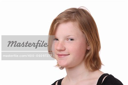 Portrait of a blond teenage girl on white background