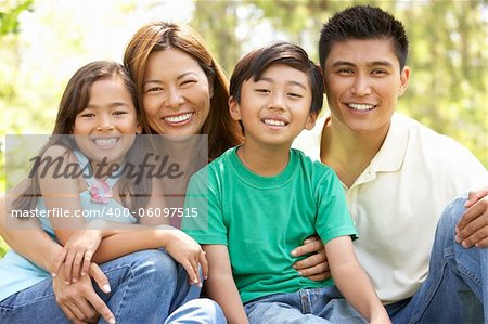 Family Enjoying Day In Park