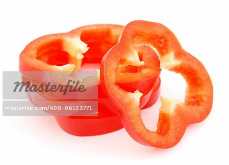 Slices of red bell pepper isolated on white background