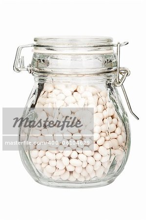 Glass jar filled with beans isolated on white