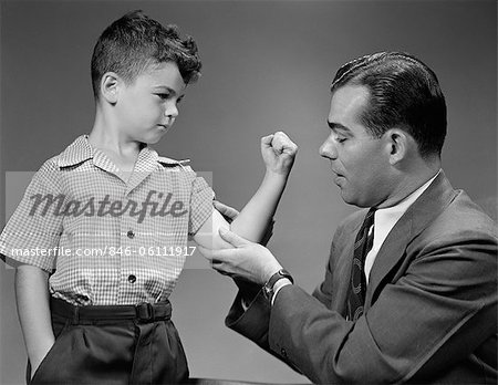 1940s BOY MAKES MUSCLE FOR MAN FATHER