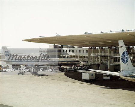 1960s VIEW OF PAN AMERICAN INTERNATIONAL TERMINAL AND AIRPLANES TRAVEL VACATION BUSINESS 1960s VIEW OF PAN AMERICAN INTERNATIONAL TERMINAL AND AIRPLANES TRAVEL VACATION BUSINESS
