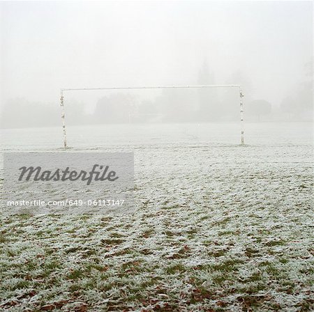 Soccer goal in frosty field