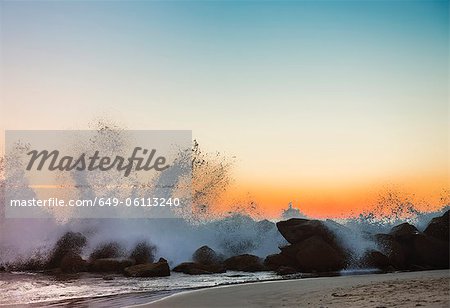 Waves crashing on Venice beach at sunset, Los Angeles, USA