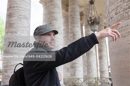 Man admiring architecture, St Peter's Square, Vatican City