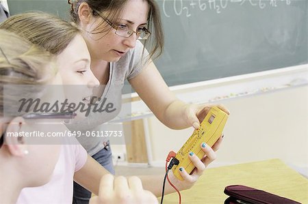 Teacher and students in technology lab