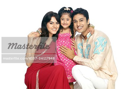 Parents with daughter smiling