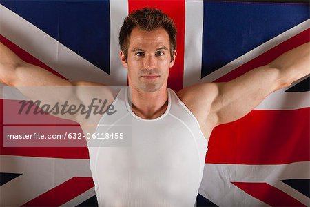 Athlète masculin devant le drapeau britannique, portrait