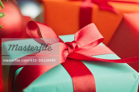Festively wrapped Christmas gift, close-up Festively wrapped Christmas gift, close-up