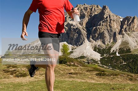 Jogger in the Dolomites, South Tyrol, Italy