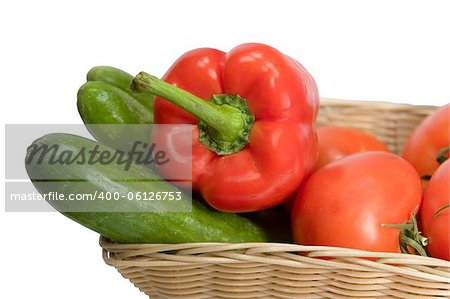 Basket with vegetables on white background with clipping path