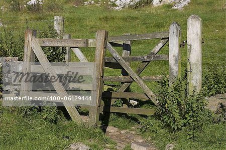 Wooden kissing gate, dovedale, peak district national park, uk