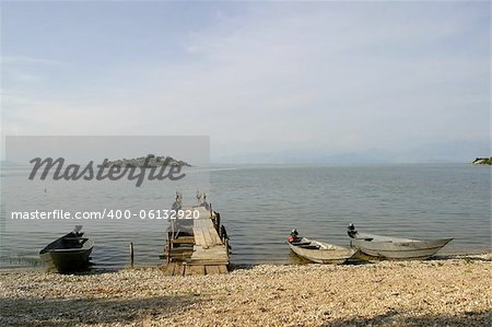 wooden fishing boats and jetty