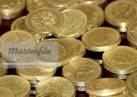 A hoard of fifty pound coins [sterling].